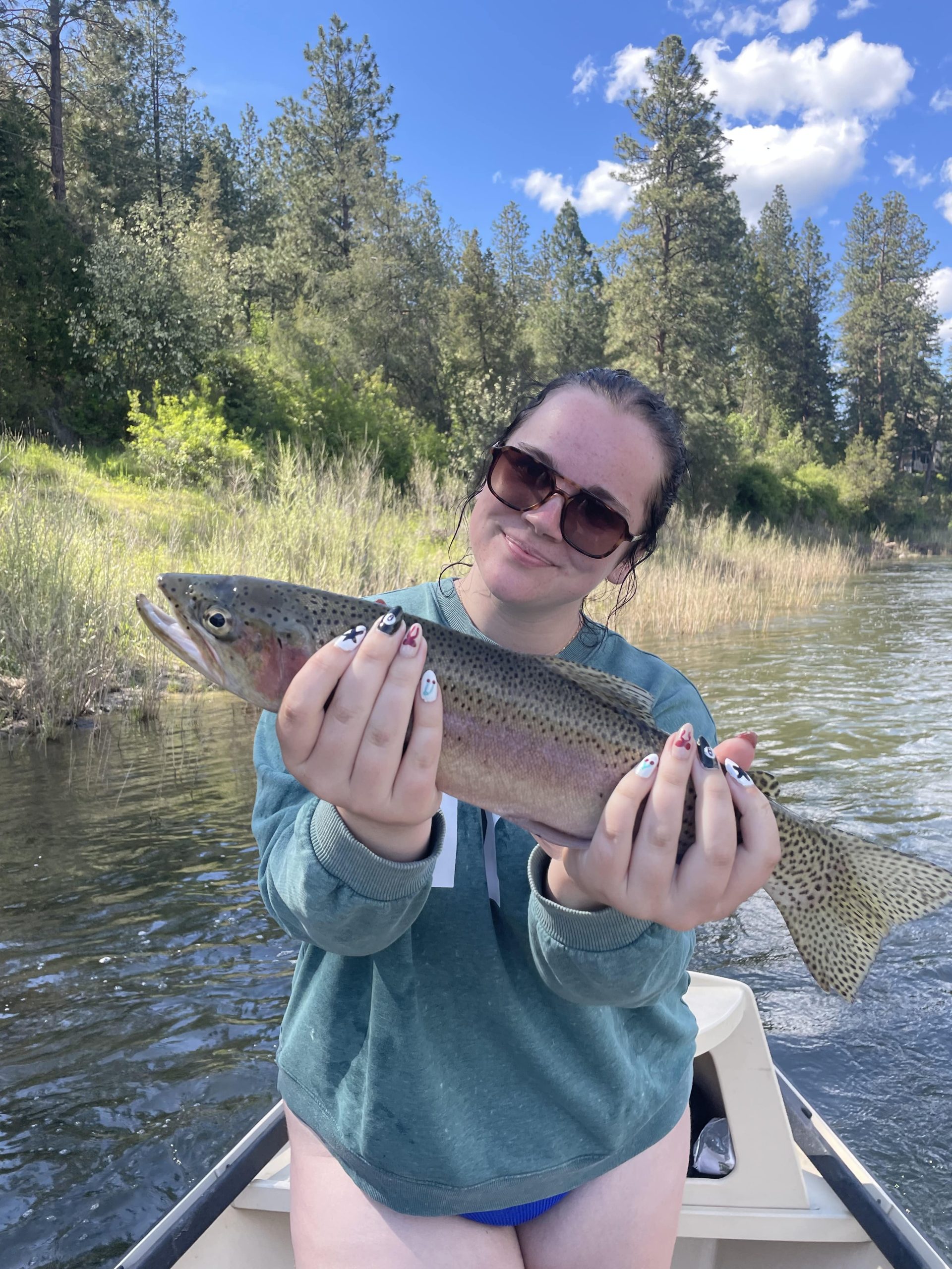 Angler wading a small Montana canyon stream